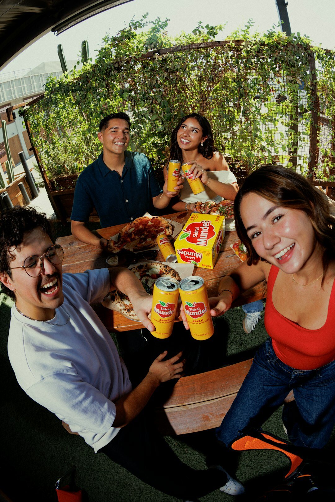 Diverse group of Mexican students smiling together outdoors