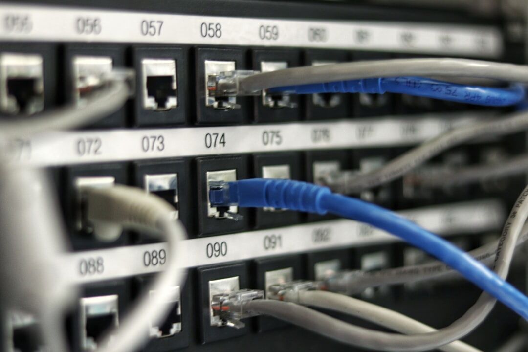 Server racks in a data center with blue lights
