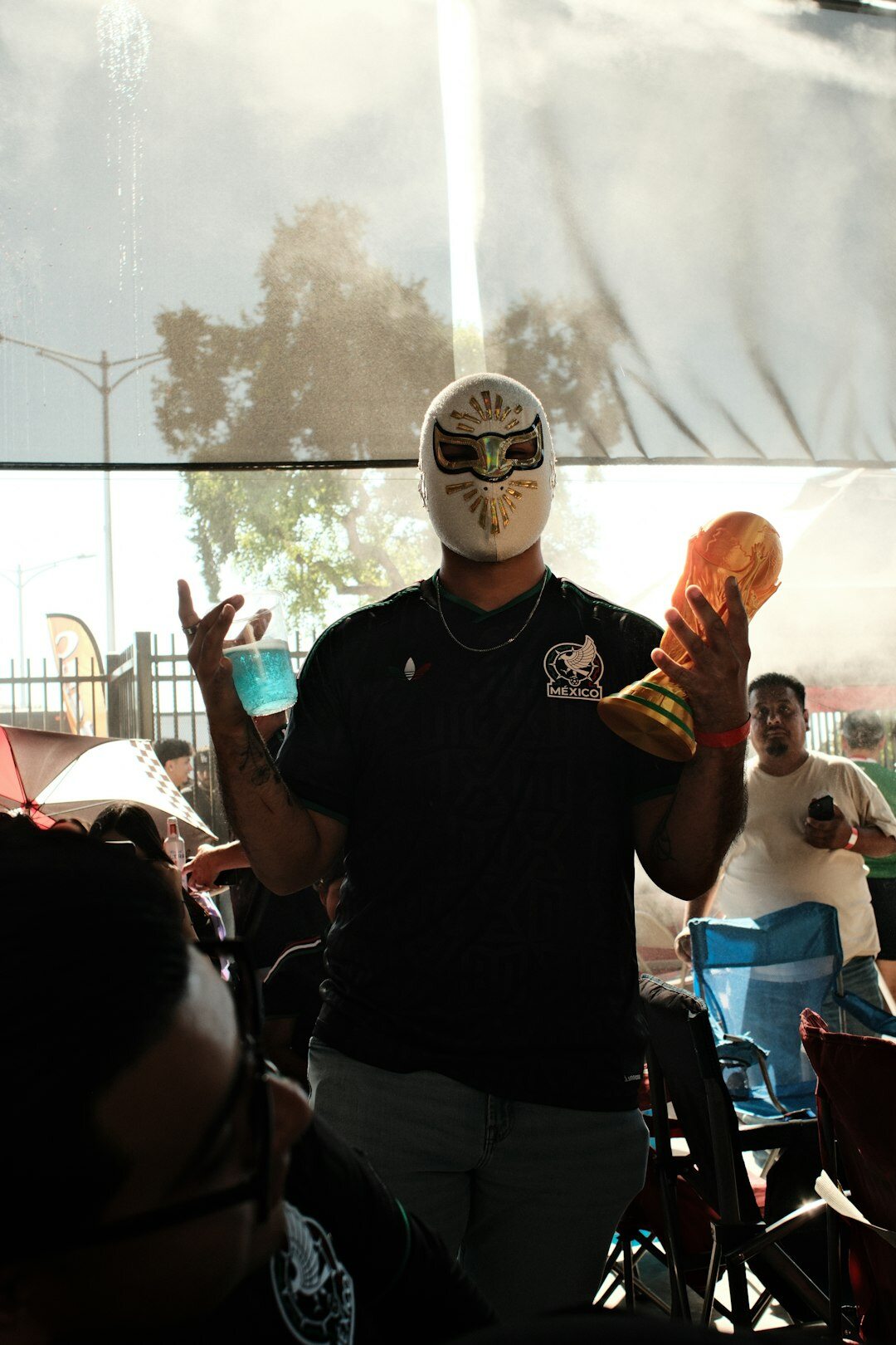 Mexican instructor teaching a programming class pointing at a screen